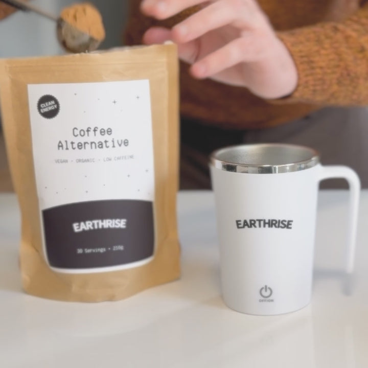 A person scooping Earthrise into a mug and blending it