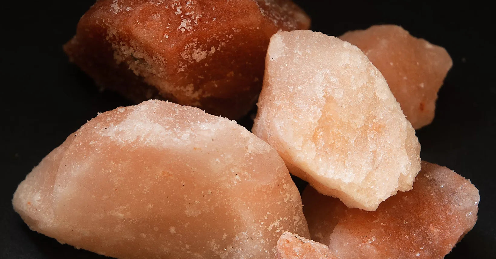 Himalayan pink salt sitting on a table